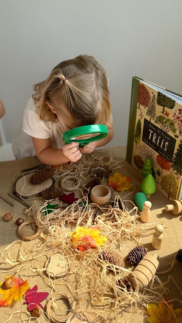 Children discovering and exploring at Sandcastle Nursery