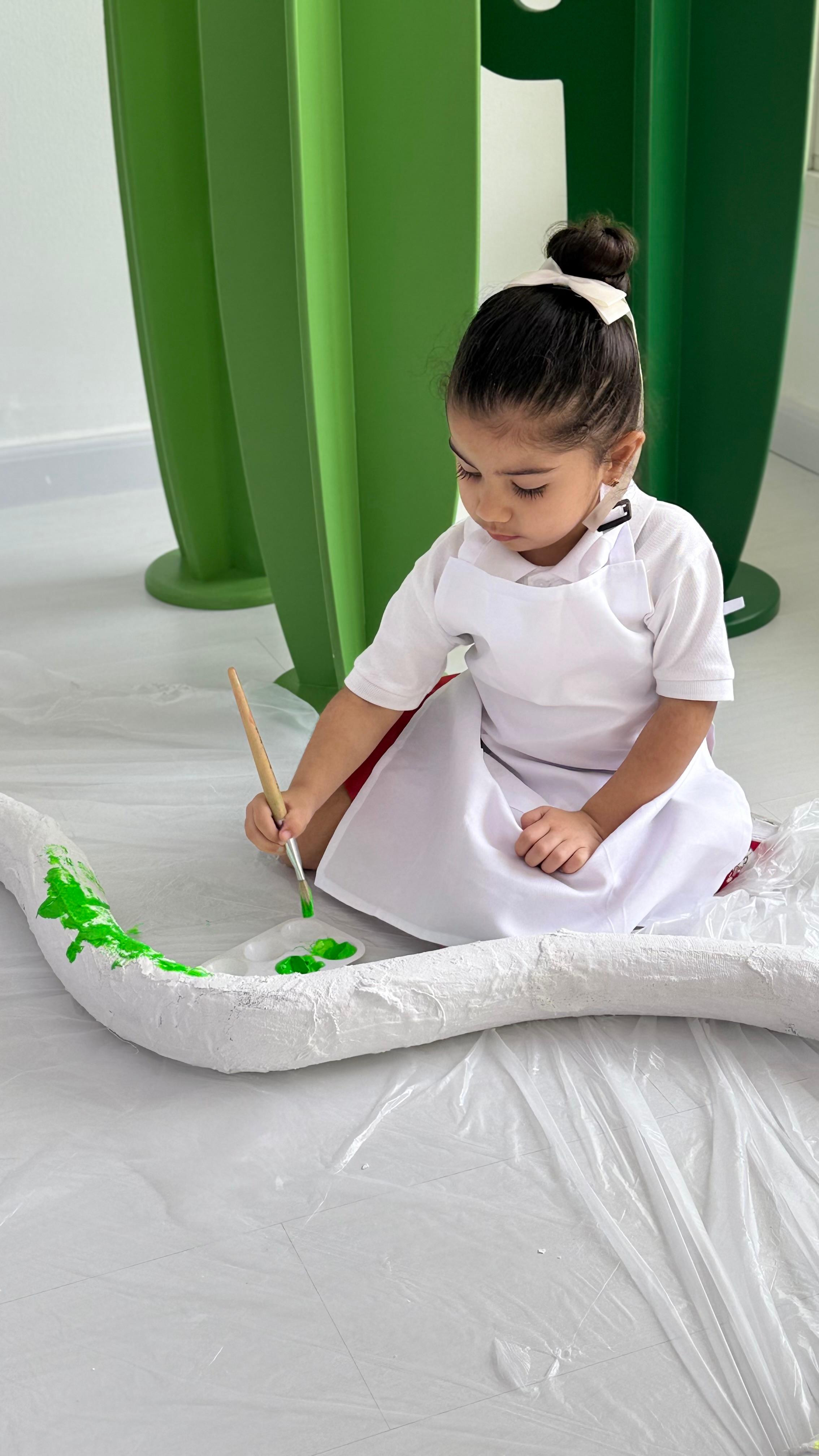 Nursery age children creating art