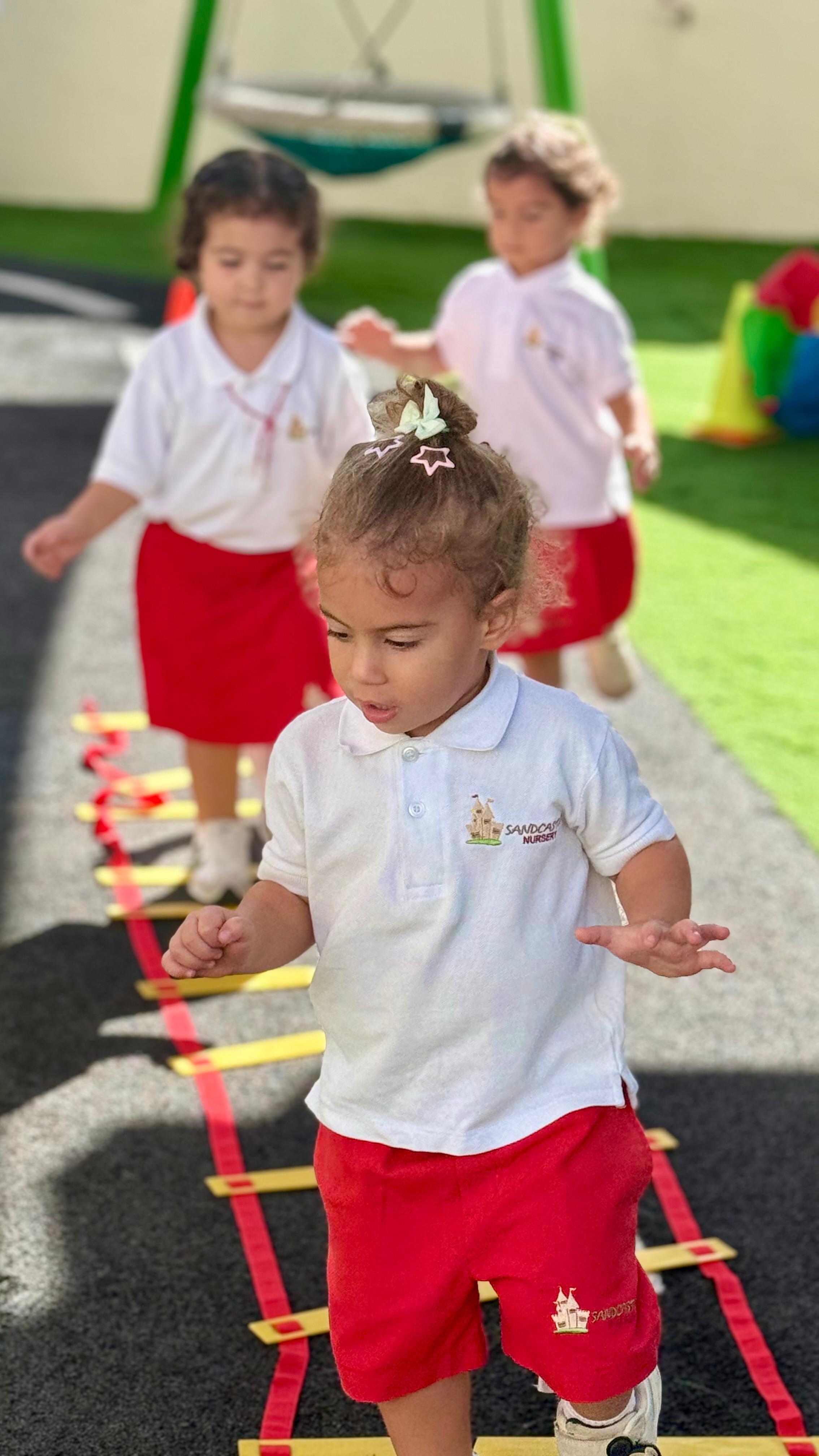 Children developing coordination outdoors